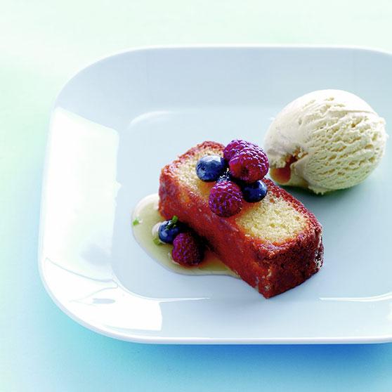 Marzipan cake with berries and ice cream