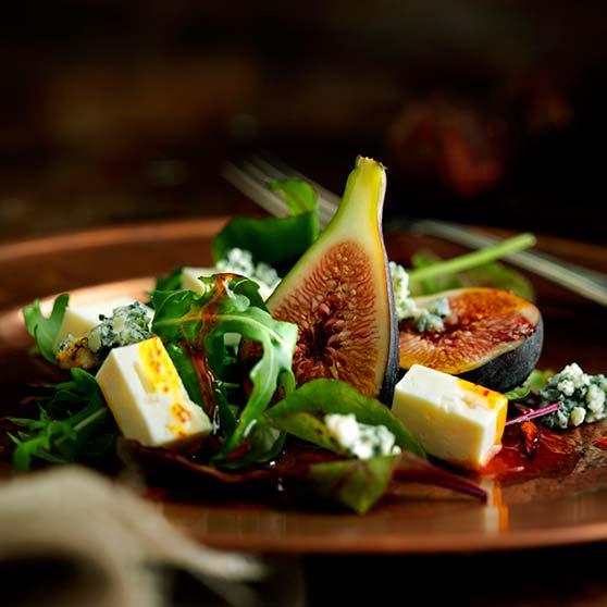 Cheese salad with saffron dressing