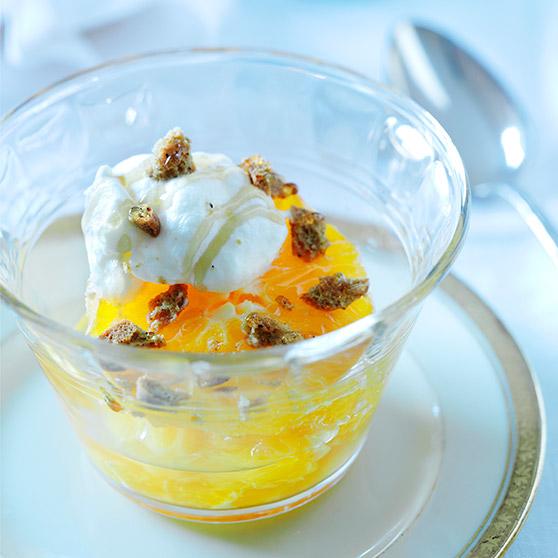 Orange salad with sweet cream and gingerbread