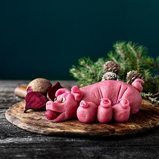 Marzipan Christmas pigs with beetroot colouring