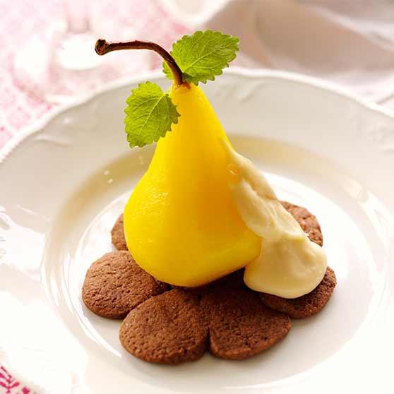 Wine-poached pears on a sweet pastry crust with vanilla custard
